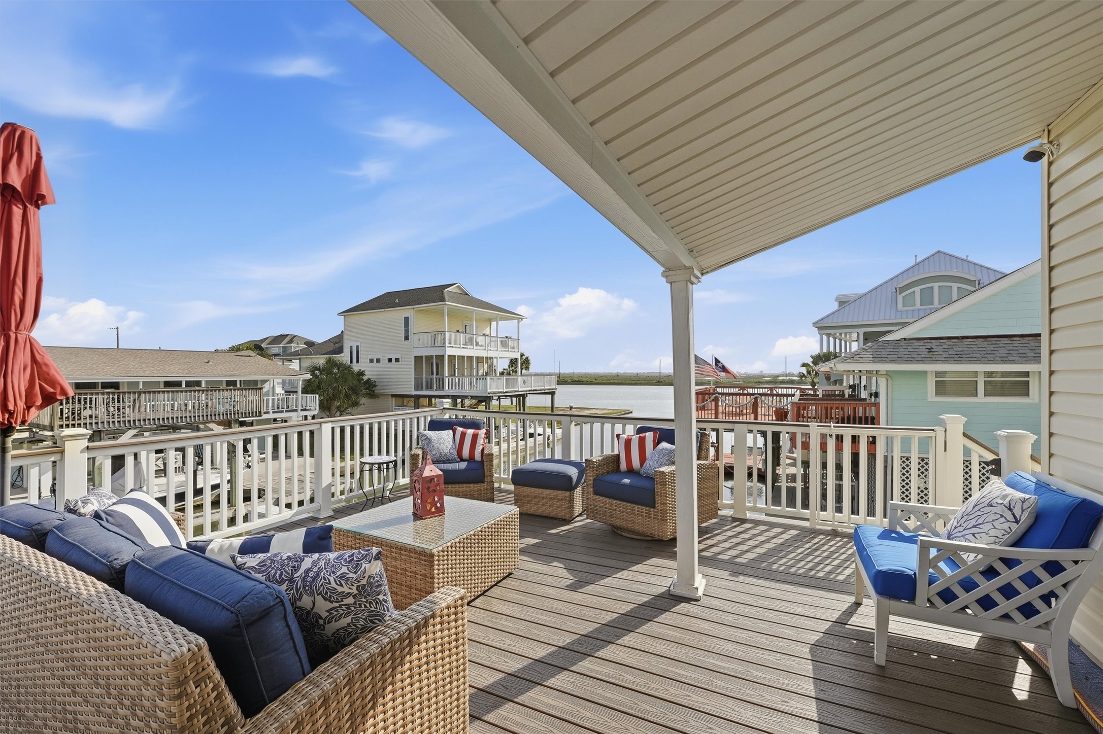 16635 Jamaica Cove Road Jamaica Beach, TX 77554 - Photo 35 of 45 a view of a balcony with wooden floor