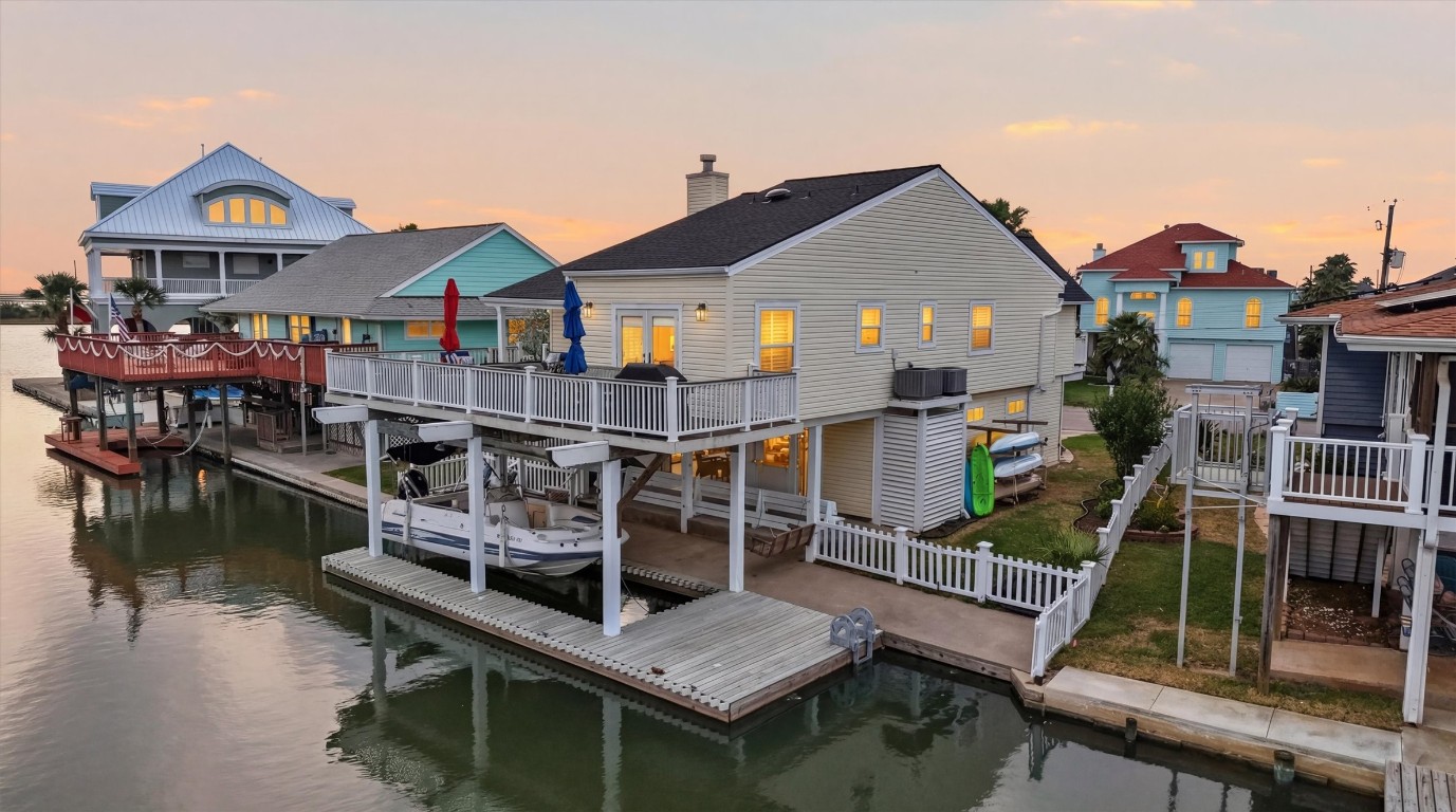 16635 Jamaica Cove Road Jamaica Beach, TX 77554 - Photo 39 of 45 a front view of a house with a boat