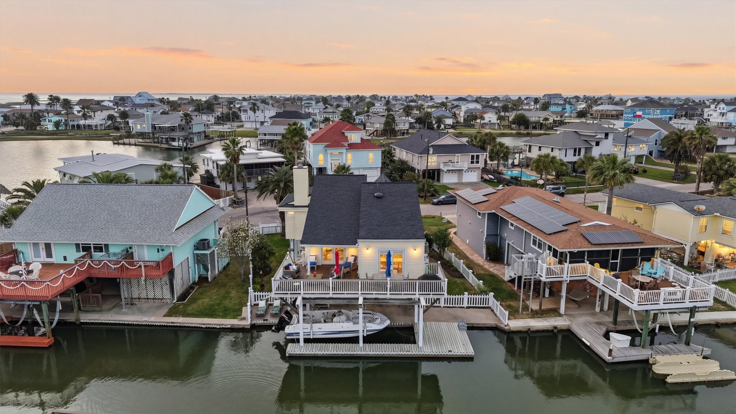 16635 Jamaica Cove Road Jamaica Beach, TX 77554 - Photo 43 of 45 This pristine waterfront home features expansive decking, a private dock, and direct canal access for boating and fishing. The waterman's dream!