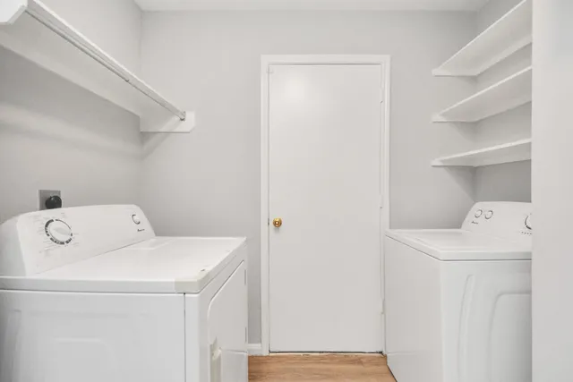 a utility room with dryer and washer