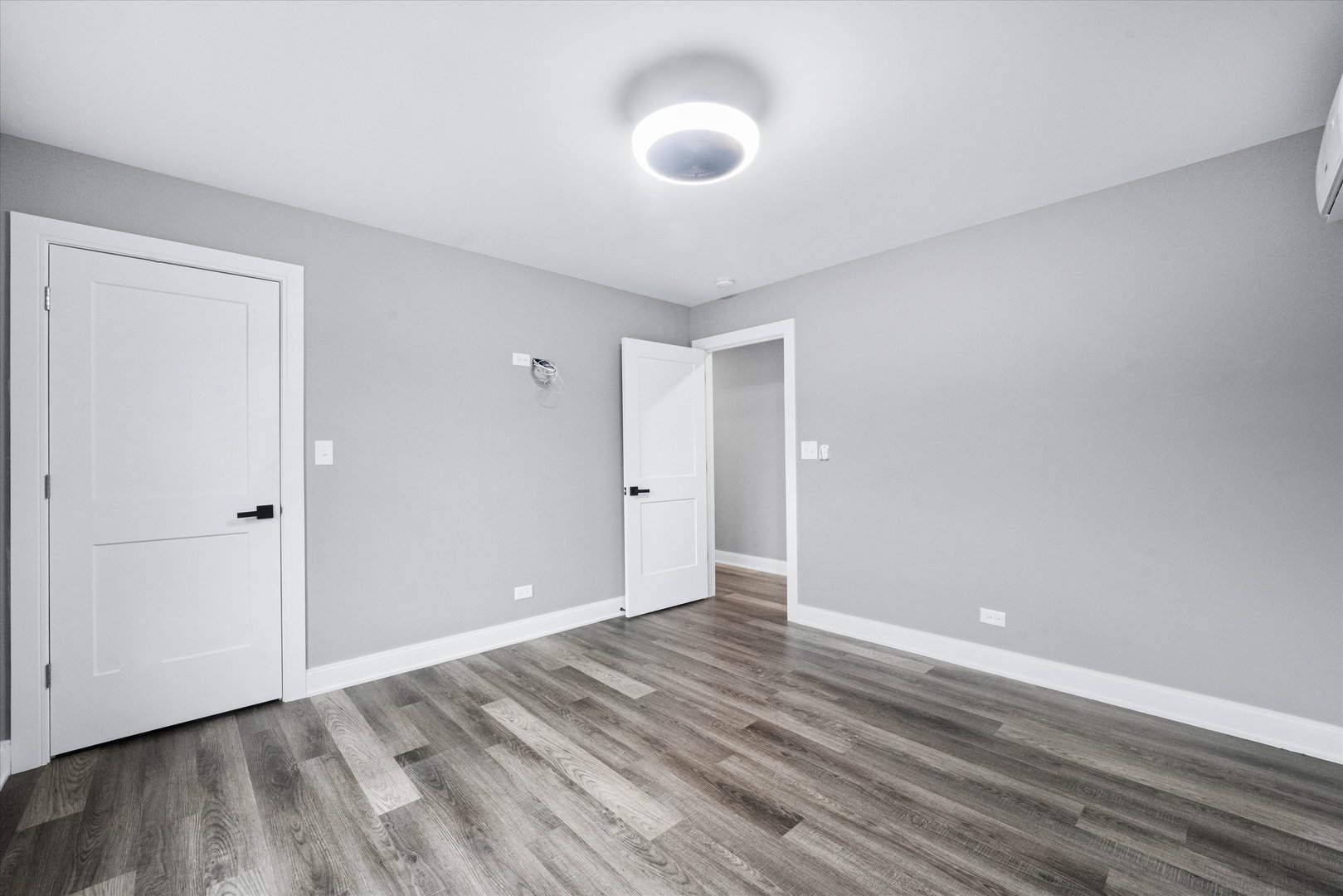 1016 South State Street, Unit 4 Lockport, IL 60441 - Photo 13 of 26 a view of an empty room and wooden floor