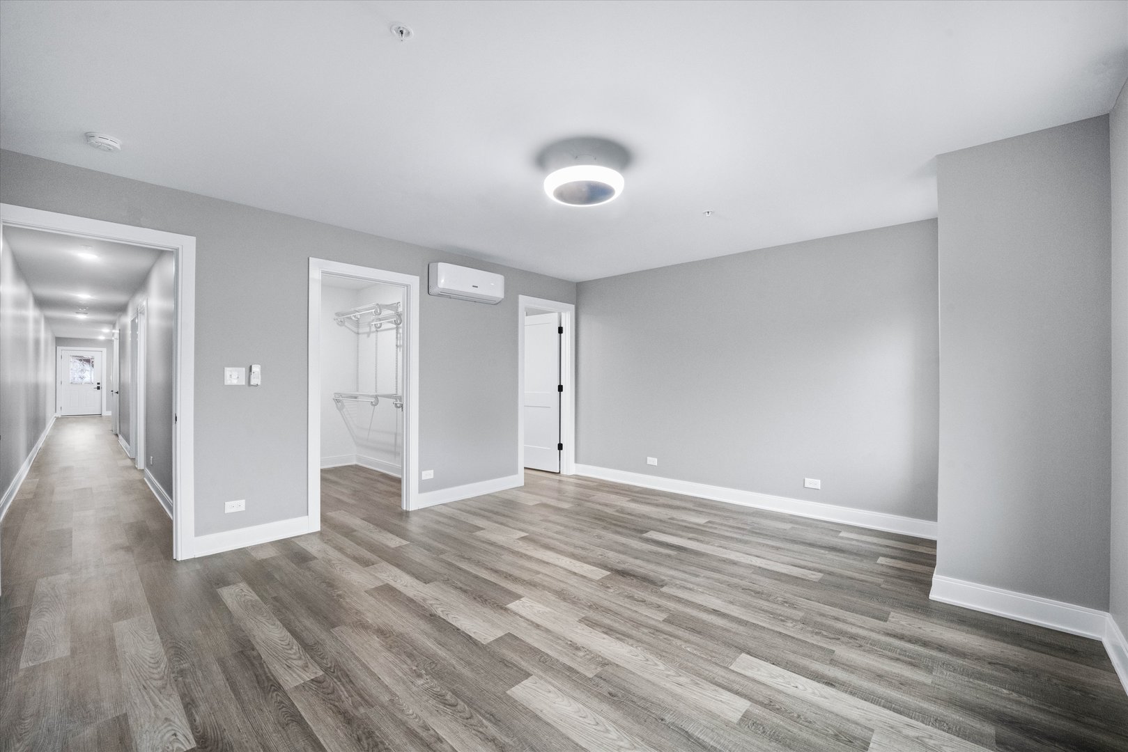 1016 South State Street, Unit 4 Lockport, IL 60441 - Photo 14 of 26 wooden floor in an empty room with a window