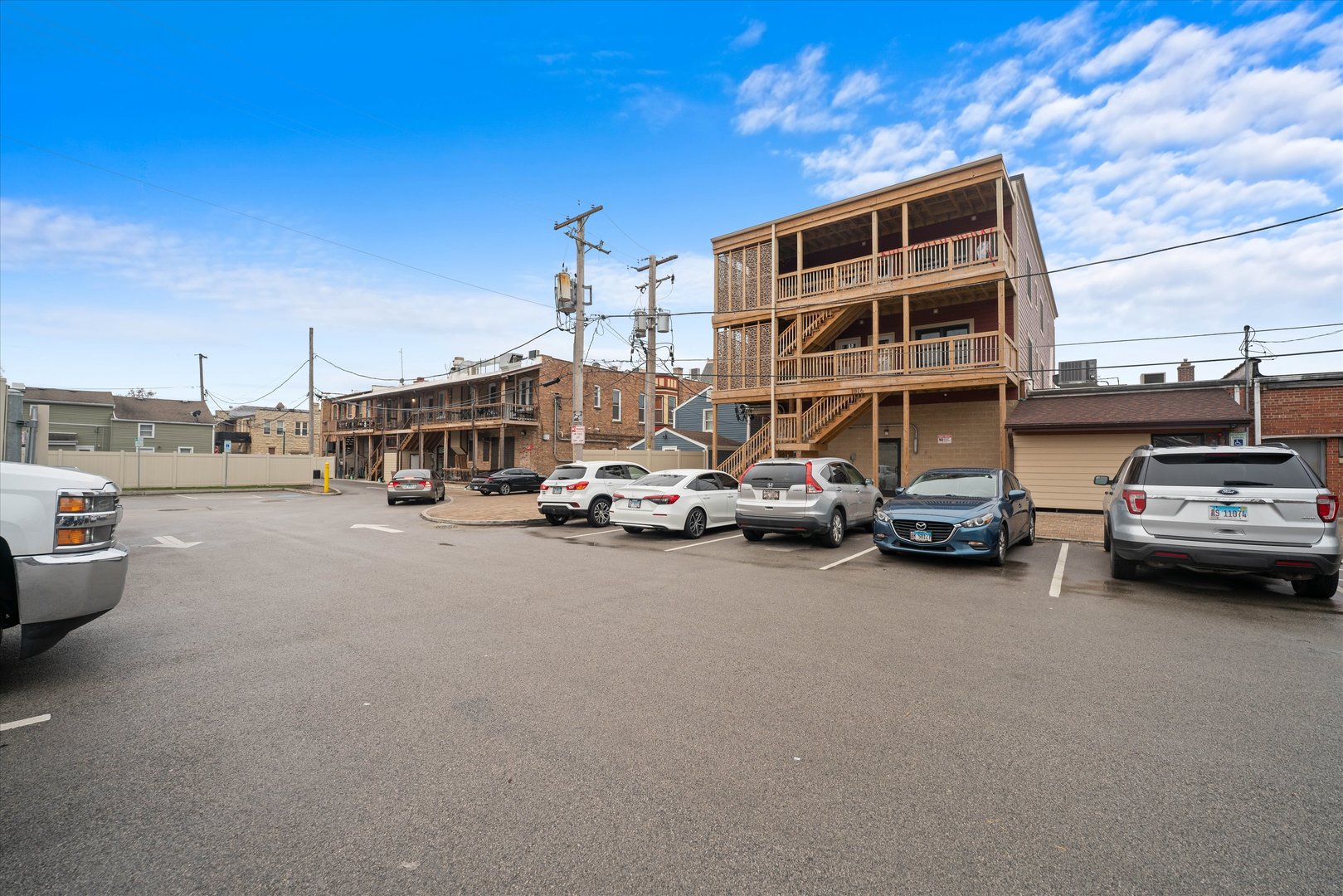 1016 South State Street, Unit 4 Lockport, IL 60441 - Photo 18 of 26 a car parked in front of the building