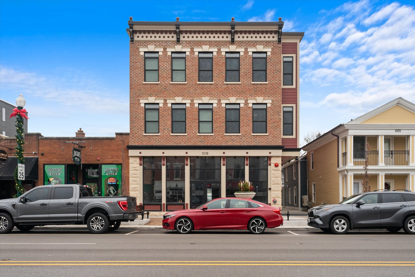 1016 South State Street, Unit 4 Lockport, IL 60441 - Photo 22 of 26 a cars parked in front of a building