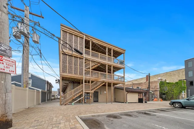 a view of a building with a street