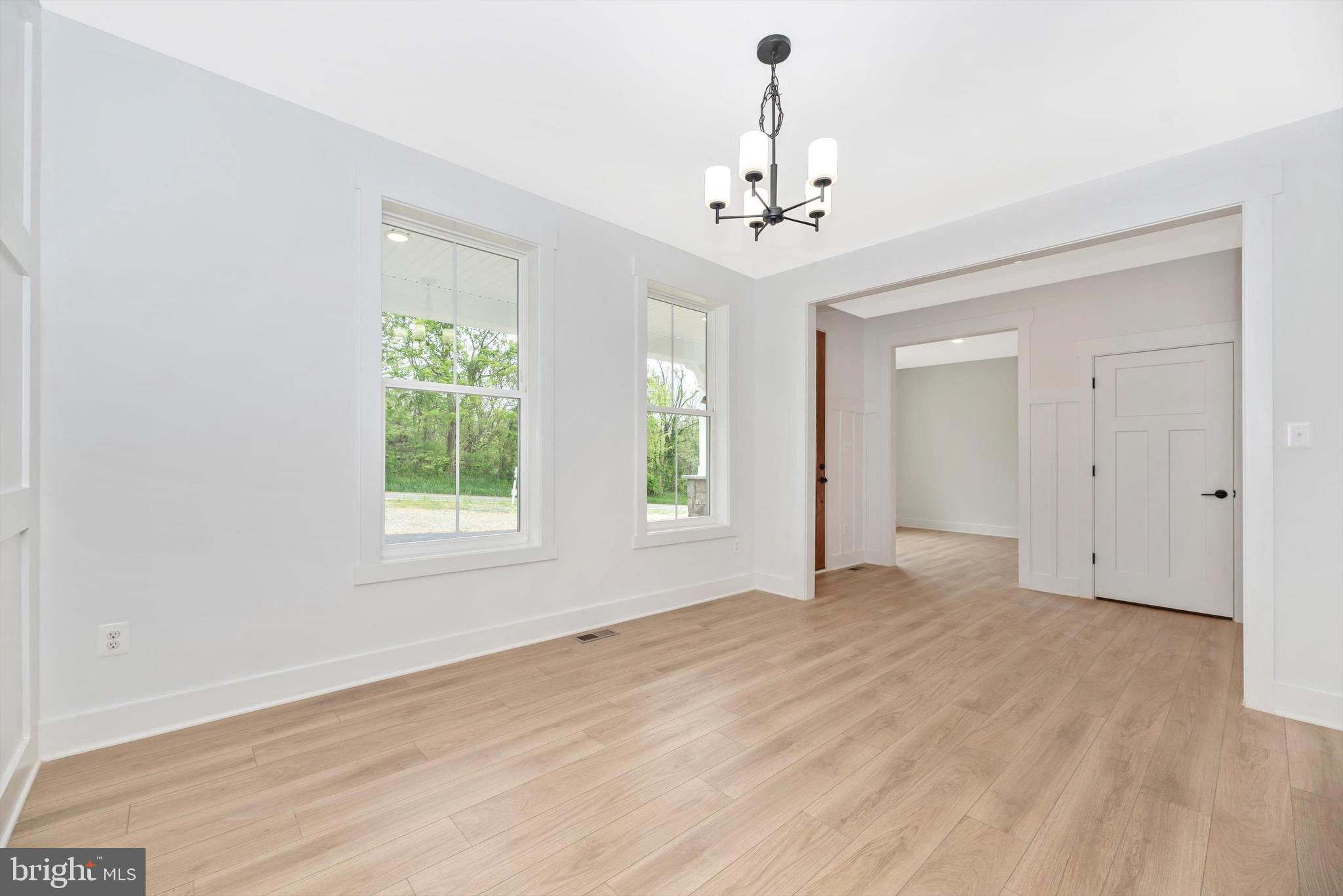 0 Cherryfield Road Fort Washington, MD 20744 - Photo 3 of 8 a view of an empty room with a window