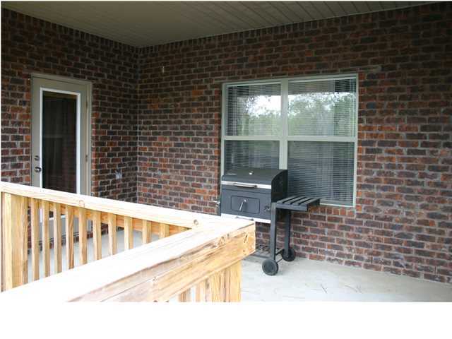 658 Red Fern Road Crestview, FL 32536 - Photo 18 of 20 a view of a balcony with chairs