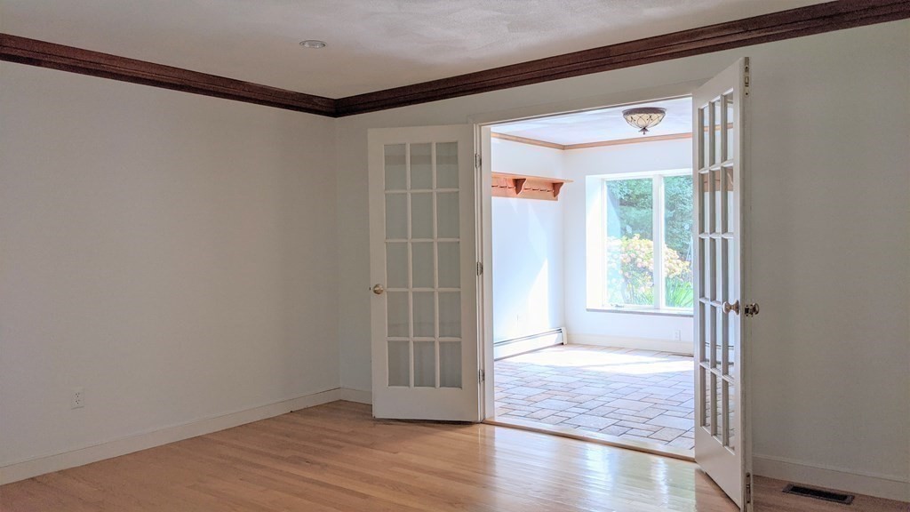 92 Lyman Road Berlin, MA 01503 - Photo 12 of 32 a view of entryway with wooden floor