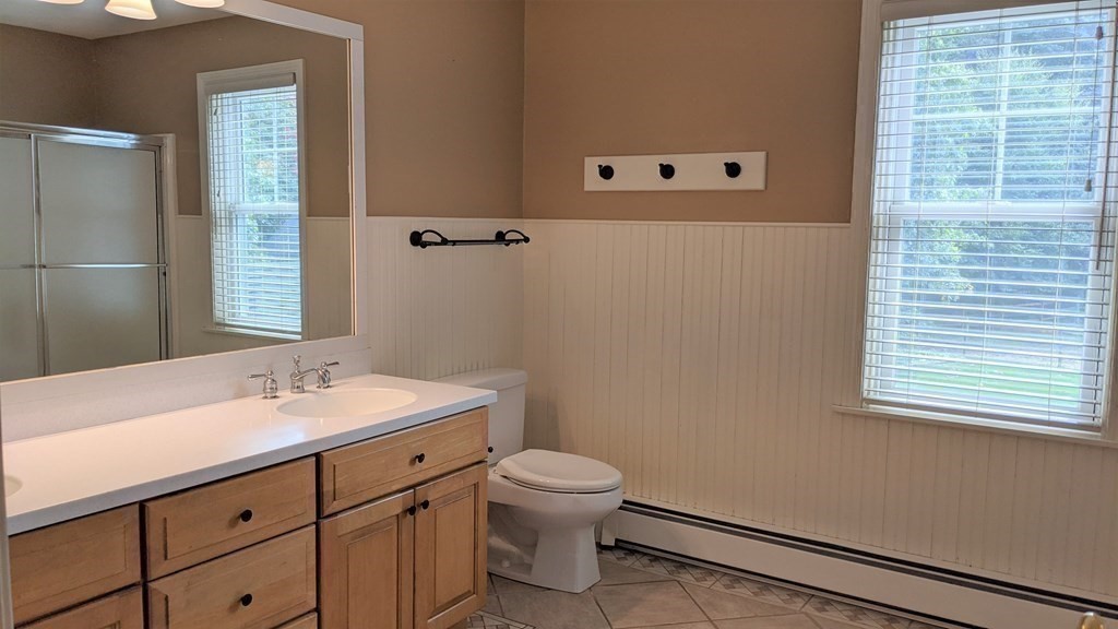 92 Lyman Road Berlin, MA 01503 - Photo 24 of 32 a bathroom with a sink toilet and shower