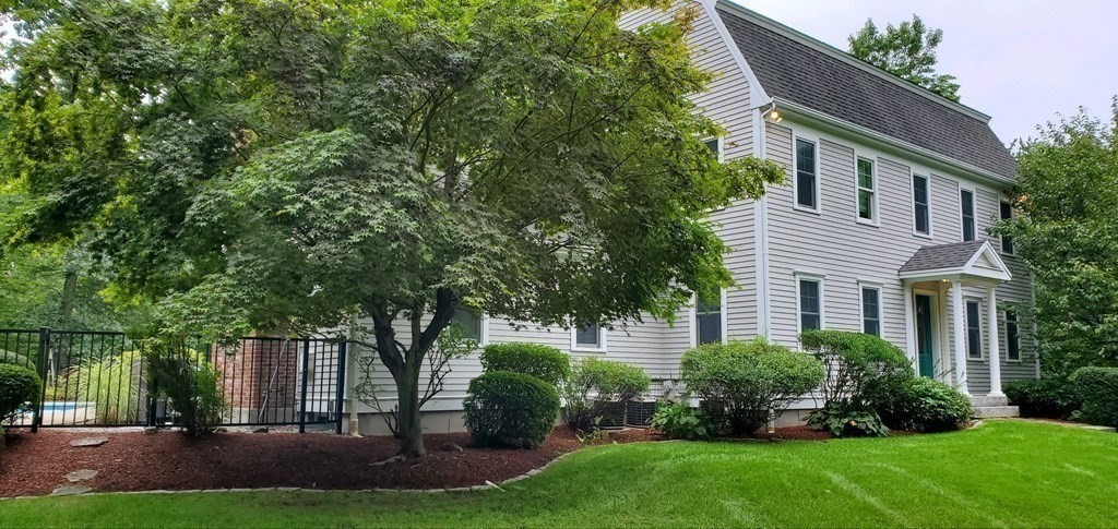 92 Lyman Road Berlin, MA 01503 - Photo 5 of 32 front view of house with a yard