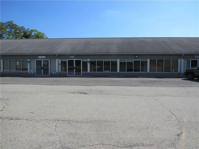 front view of a house with a small yard
