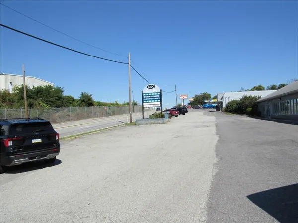 a view of a car parked on the side of the road