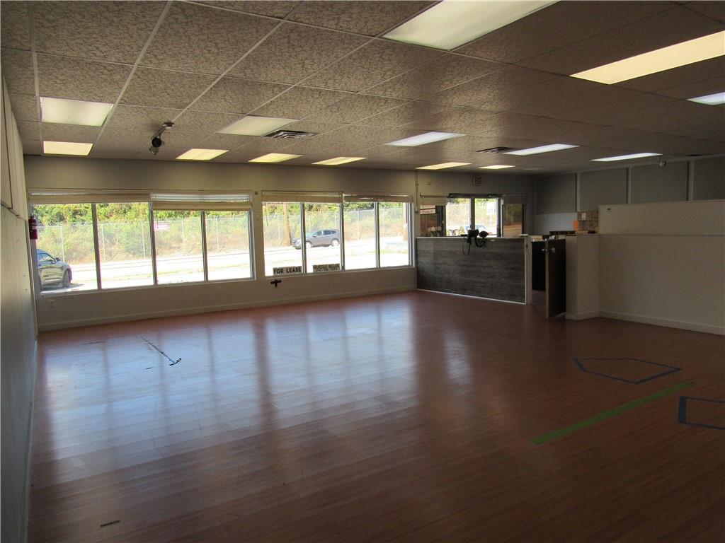 3208 Lebanon Church Road West Mifflin, PA 15122 - Photo 5 of 20 a view of empty room with wooden floor and fan