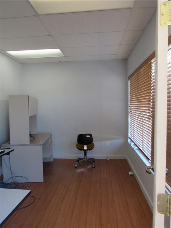 3208 Lebanon Church Road West Mifflin, PA 15122 - Photo 7 of 20 a room with wooden floor and windows