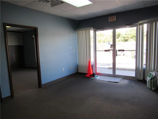 an empty room with windows