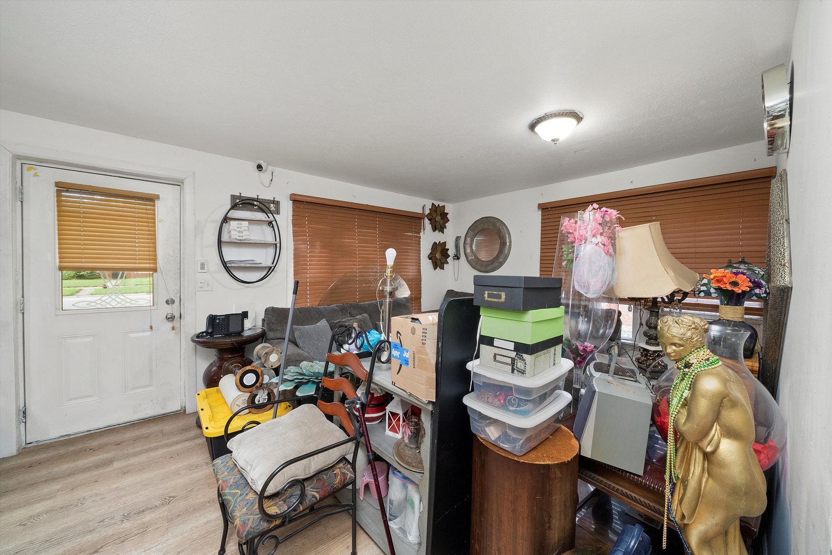 14819 Irving Avenue Dolton, IL 60419 - Photo 11 of 21 a dining room filled with furniture and a window