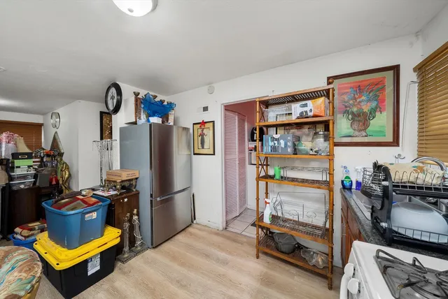 a room with furniture and workspace