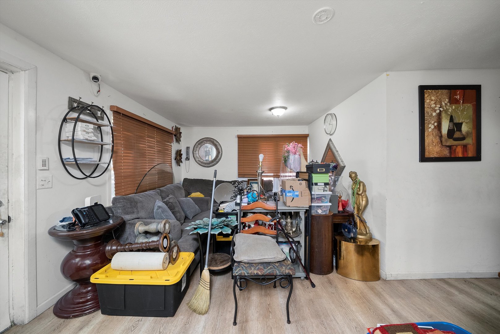 14819 Irving Avenue Dolton, IL 60419 - Photo 17 of 21 a living room with furniture and a mirror