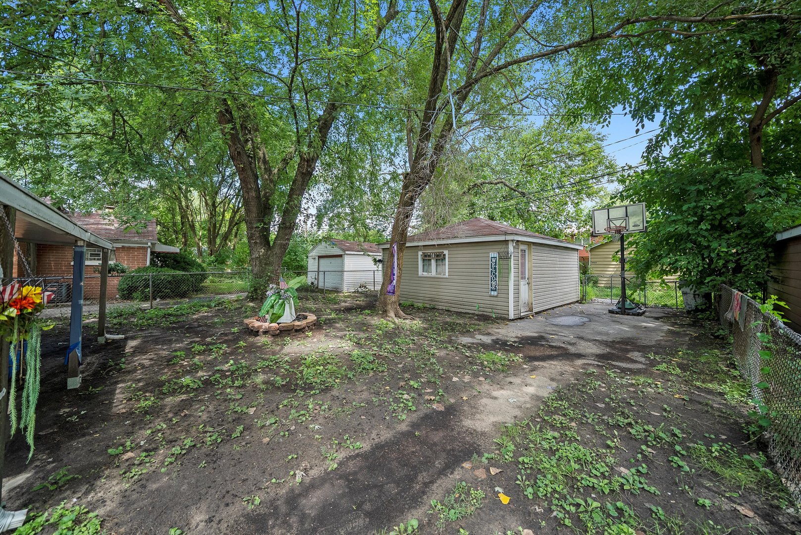 14819 Irving Avenue Dolton, IL 60419 - Photo 18 of 21 a view of a house with a backyard