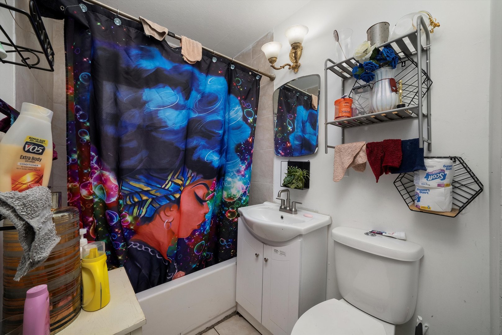 14819 Irving Avenue Dolton, IL 60419 - Photo 6 of 21 a bathroom with a sink mirror and toilet