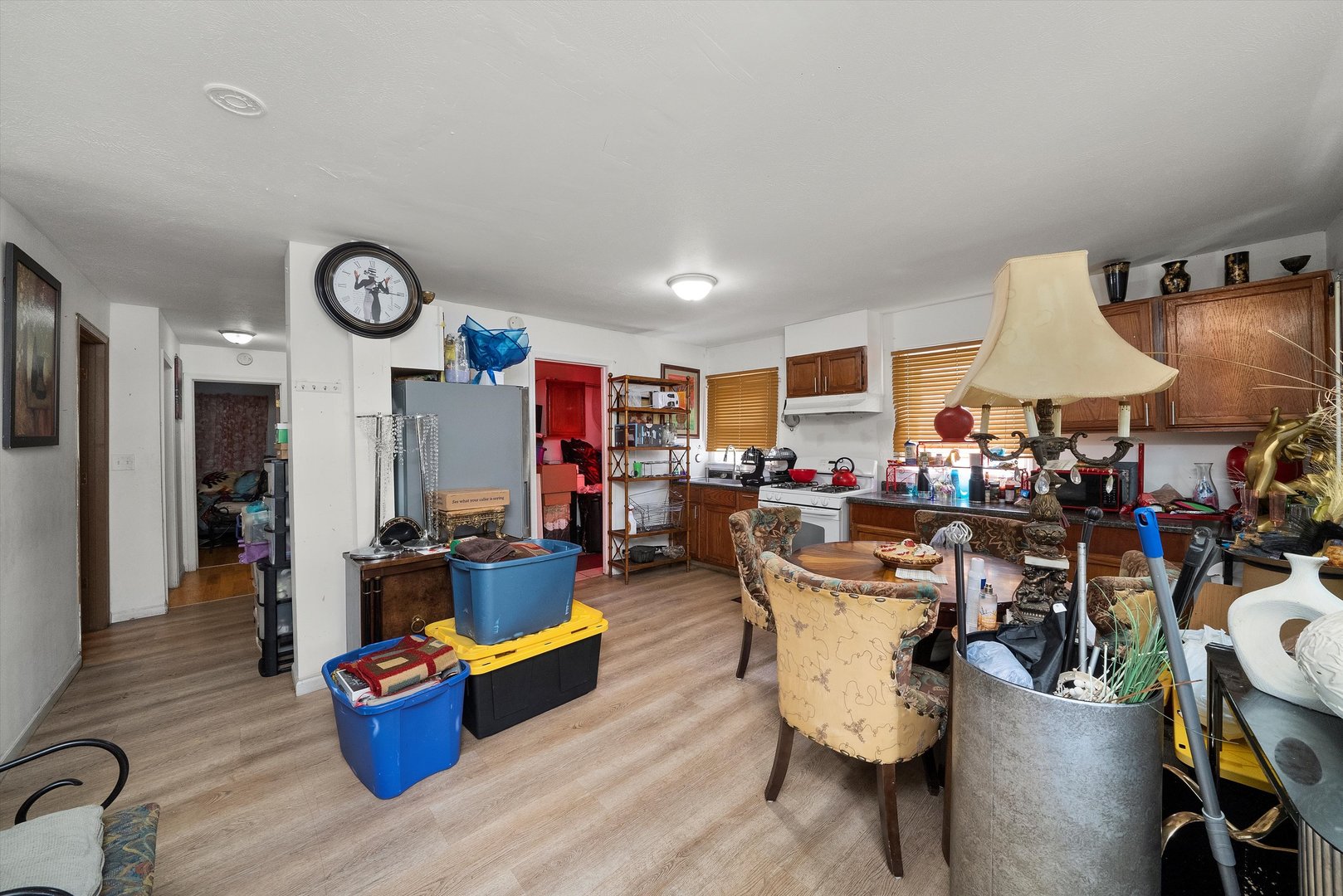14819 Irving Avenue Dolton, IL 60419 - Photo 9 of 21 a living room with furniture and a clock
