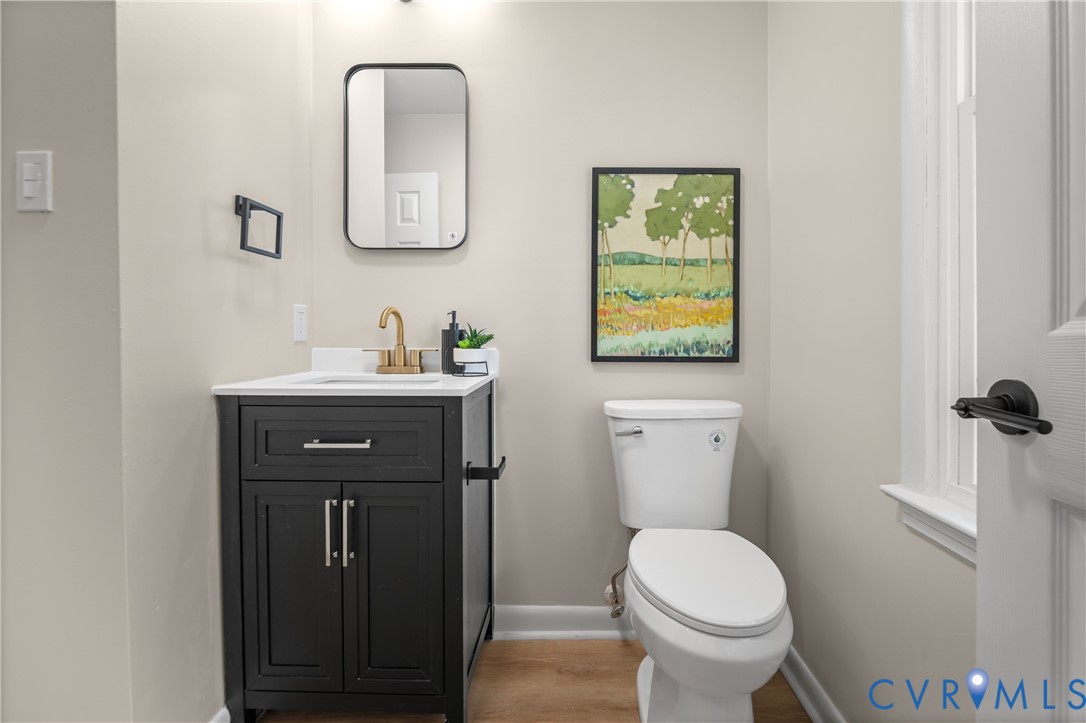 8928 Hawkbill Road North Chesterfield, VA 23237 - Photo 34 of 50 White vanity with dark cabinetry and gold-finish f