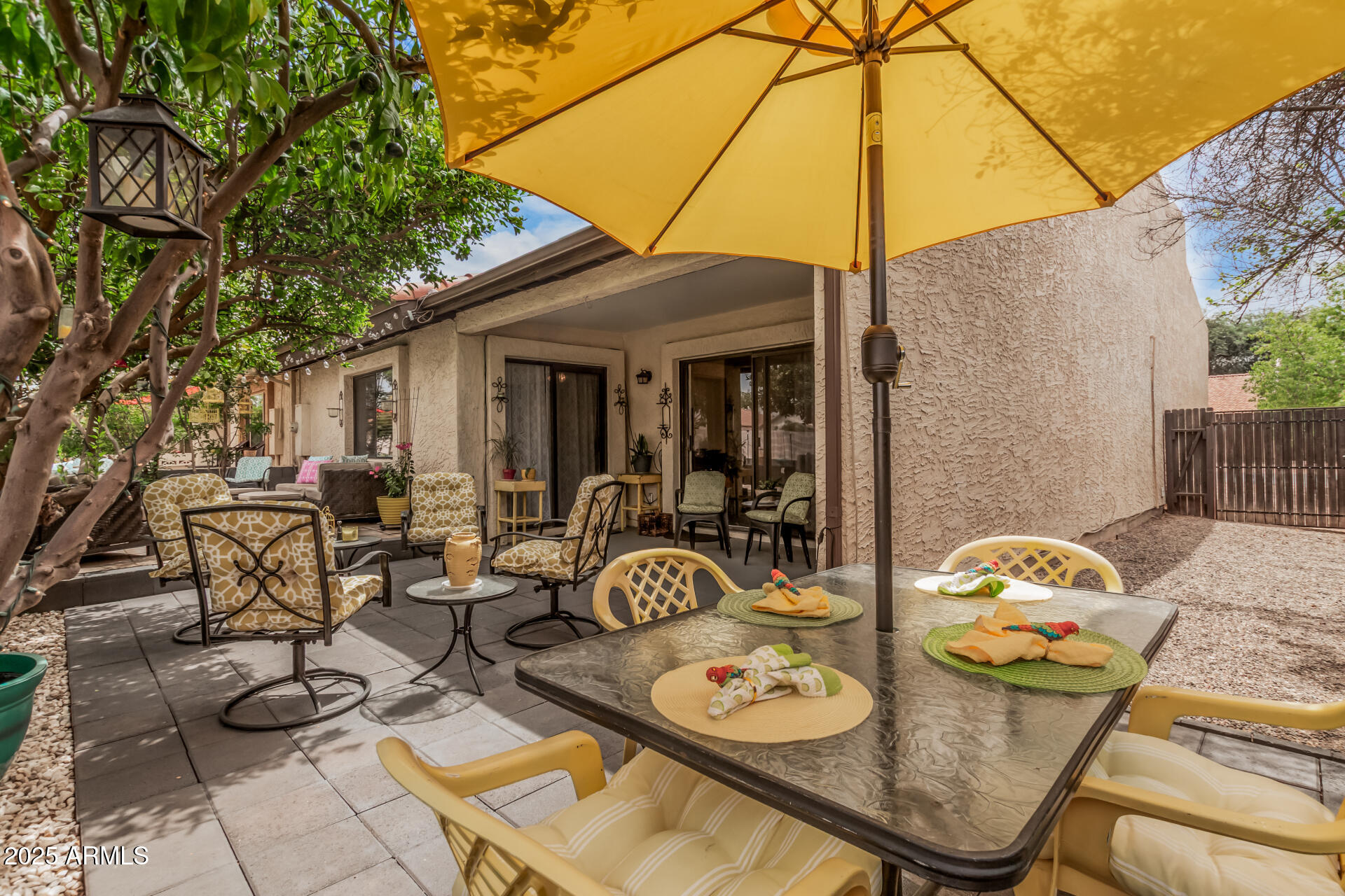 2329 North Recker Road, Unit 59 Mesa, AZ 85215 - Photo 26 of 32 Patio and Side Yard