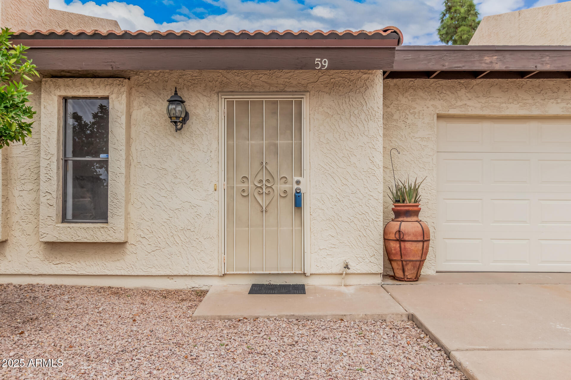 2329 North Recker Road, Unit 59 Mesa, AZ 85215 - Photo 3 of 32 Security Screen Door