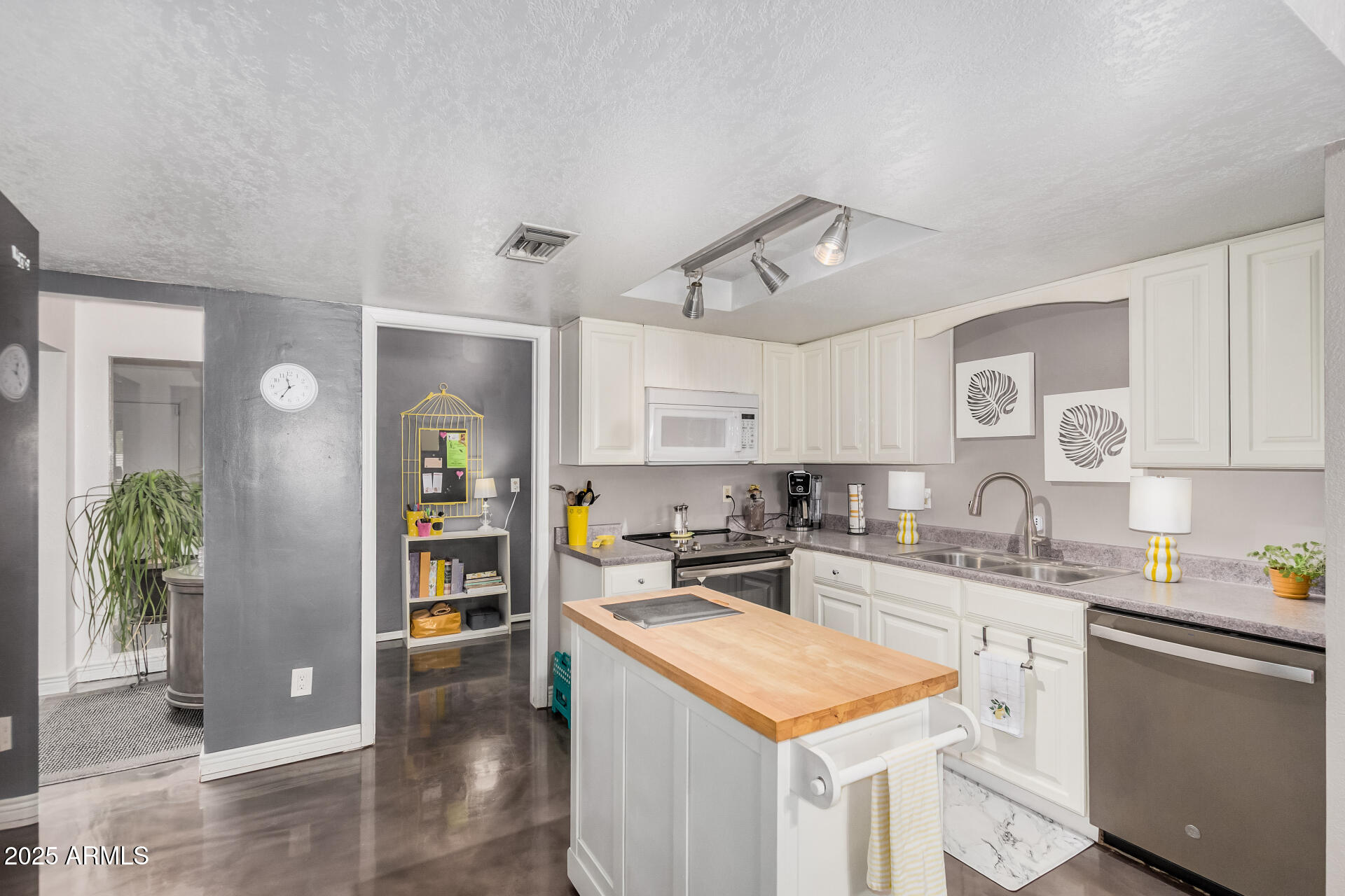 2329 North Recker Road, Unit 59 Mesa, AZ 85215 - Photo 10 of 32 Kitchen to Laundry Room