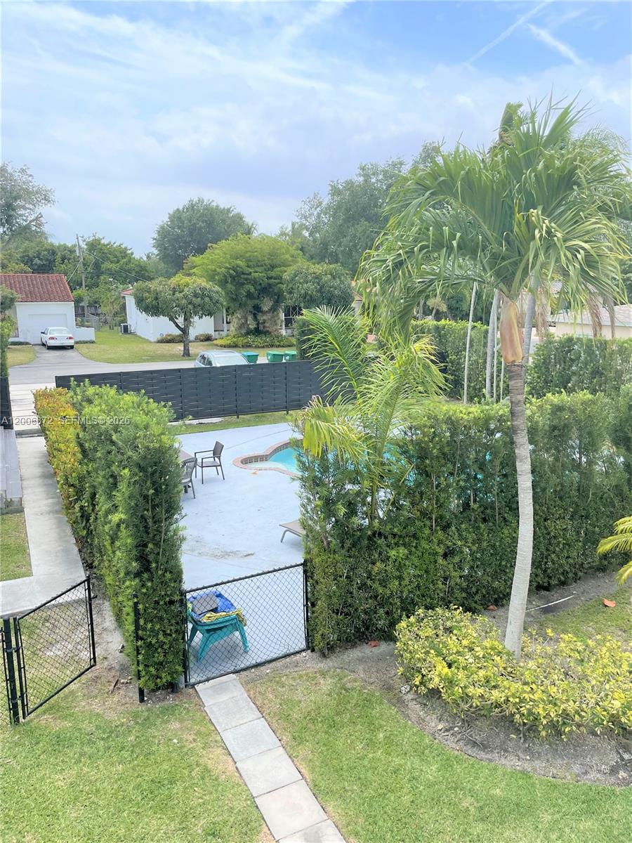5116 Southwest 57th Avenue, Unit B Miami, FL 33155 - Photo 16 of 26 an aerial view of a house with yard swimming pool and outdoor seating