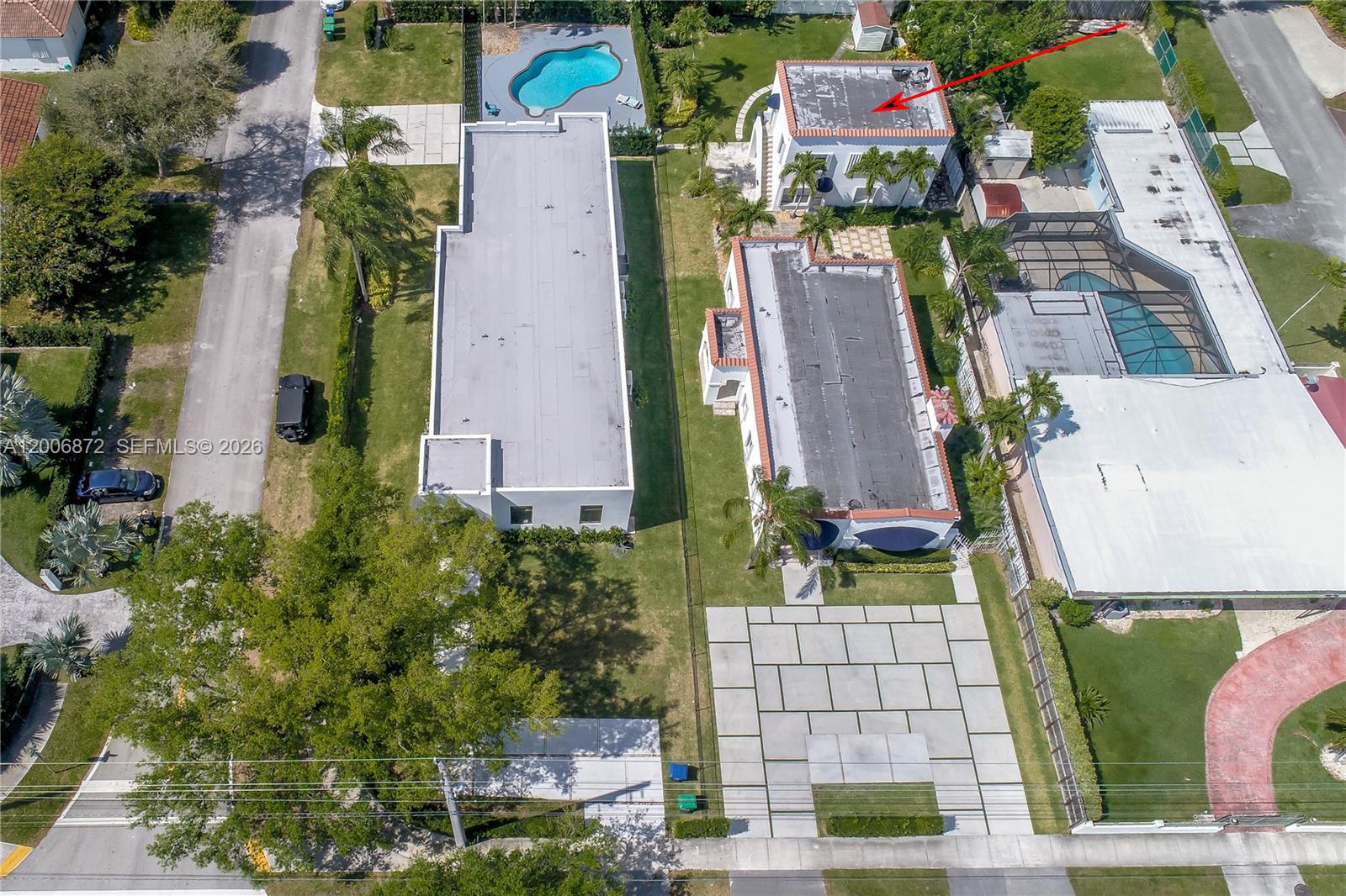 5116 Southwest 57th Avenue, Unit B Miami, FL 33155 - Photo 22 of 26 an aerial view of multiple houses with yard