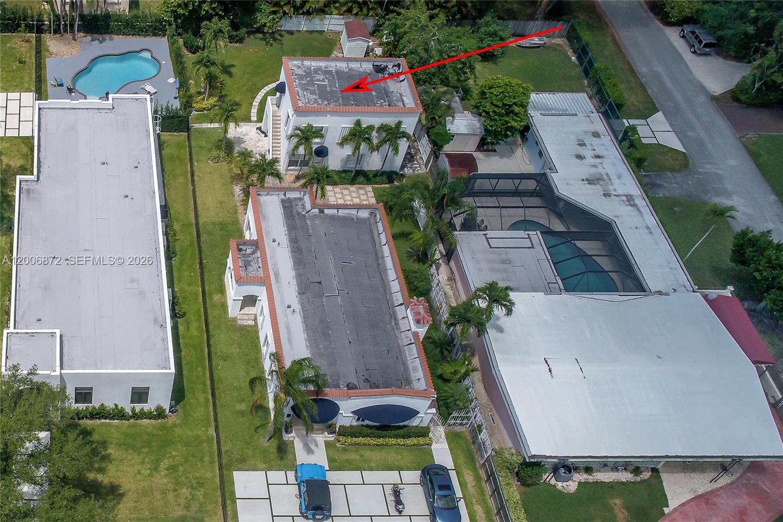 5116 Southwest 57th Avenue, Unit B Miami, FL 33155 - Photo 23 of 26 an aerial view of houses with outdoor space
