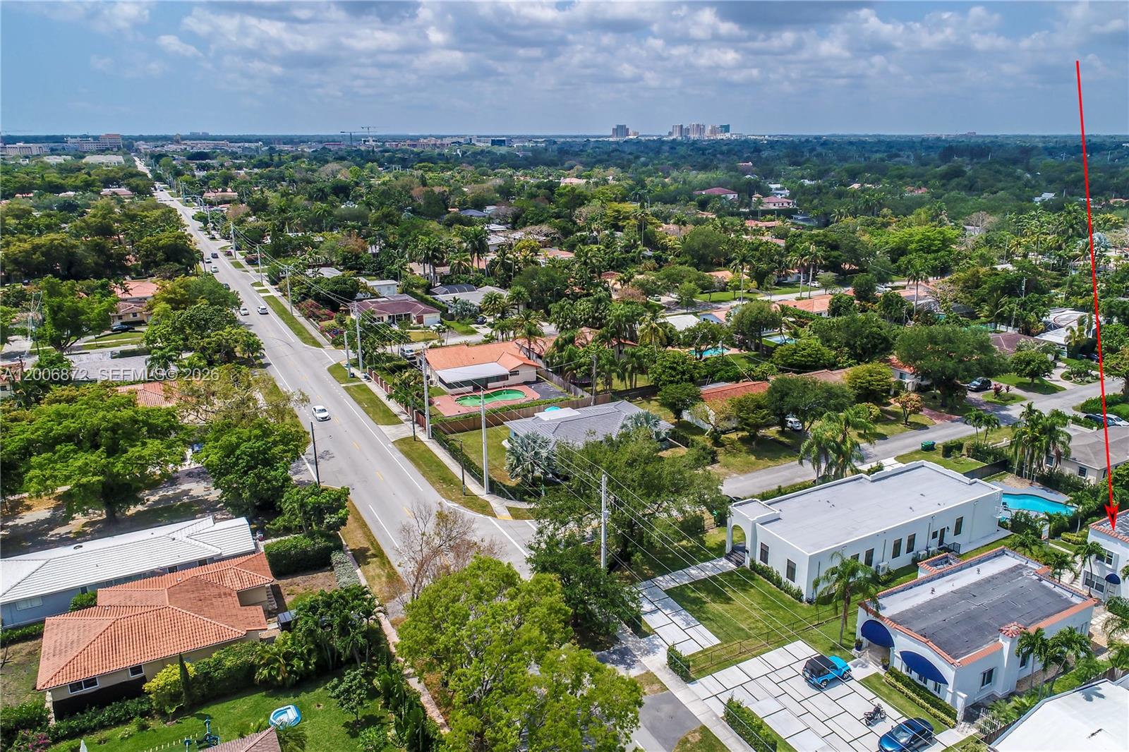 5116 Southwest 57th Avenue, Unit B Miami, FL 33155 - Photo 24 of 26 an aerial view of residential houses with outdoor space and trees