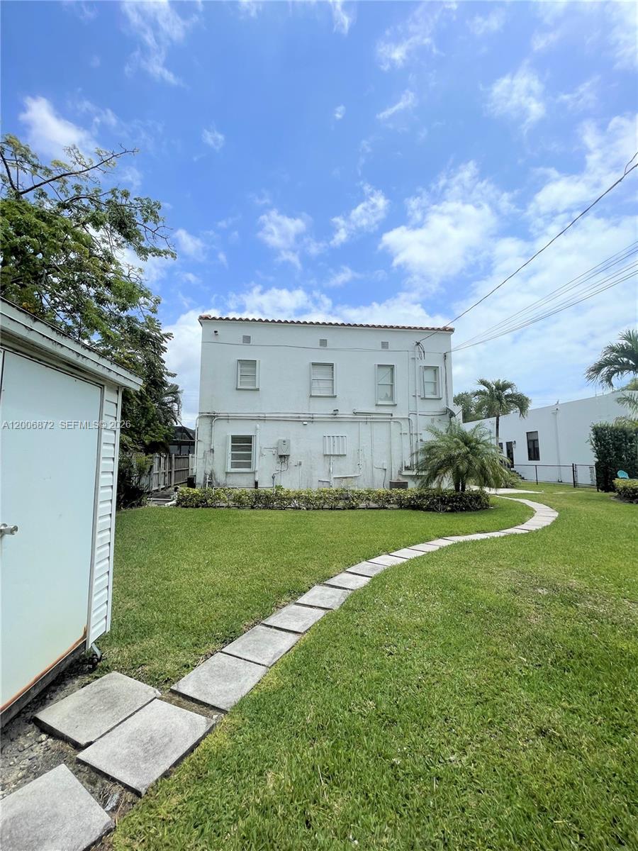5116 Southwest 57th Avenue, Unit B Miami, FL 33155 - Photo 6 of 26 a view of a back yard