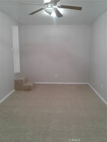 a view of a room with an empty space