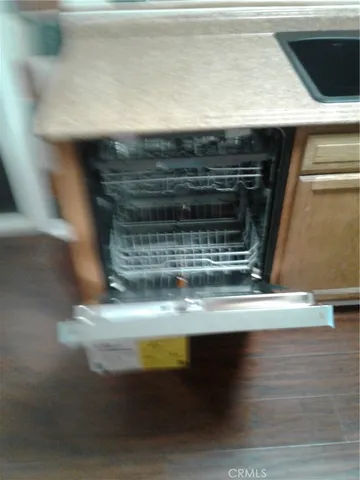 a kitchen with a stove and a cabinet