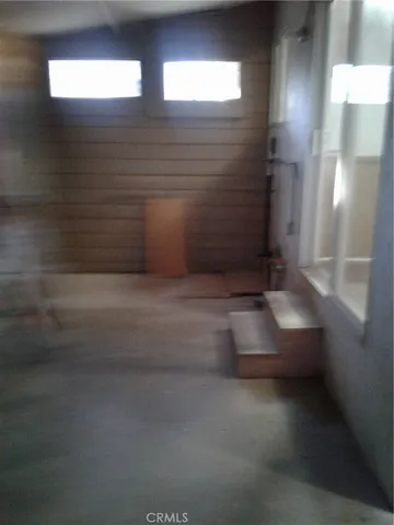 a view of a backyard of the house