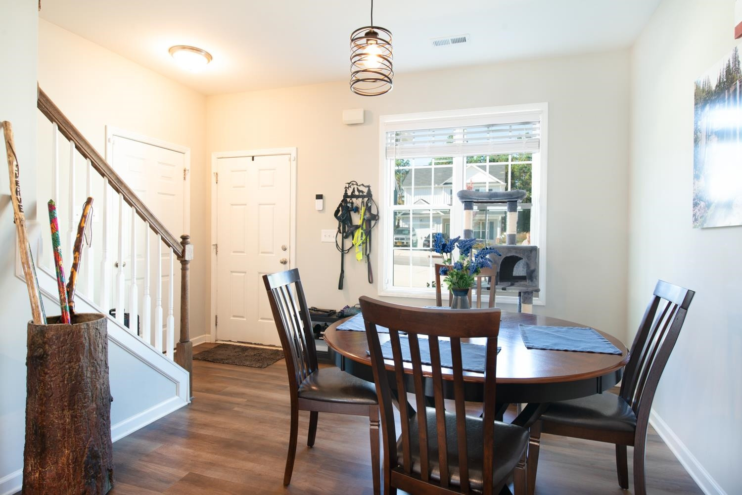 52 Principal Way Clayton, NC 27520 - Photo 12 of 31 a view of a dining room with furniture window and wooden floor