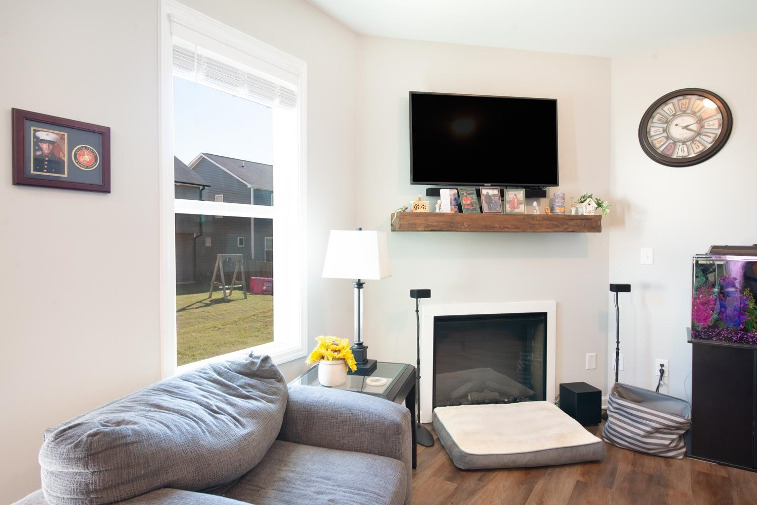 52 Principal Way Clayton, NC 27520 - Photo 8 of 31 a living room with furniture and a flat screen tv