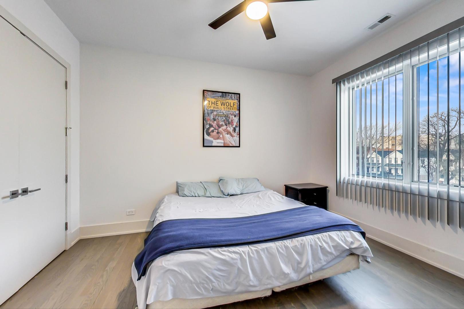 4042 North Pulaski Road, Unit 3W Chicago, IL 60641 - Photo 19 of 33 a bedroom with a bed and a window