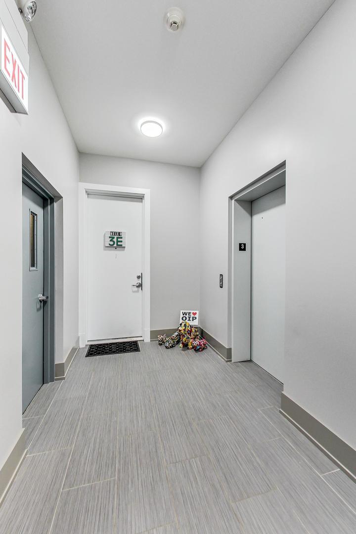 4042 North Pulaski Road, Unit 3W Chicago, IL 60641 - Photo 30 of 33 a view of a room with wooden floor