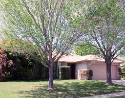 710 Quail Run Road Pflugerville, TX 78660 - Photo 1 of 1 a front view of a house with garden