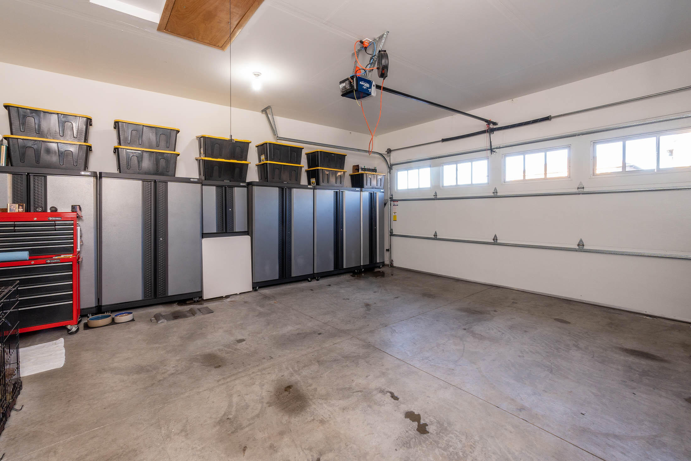 61129 Manhae Loop Bend, OR 97702 - Photo 19 of 44 Garage. Cabinets are not included. 2022 new garage door belt opener.