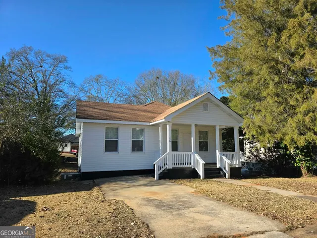 a view of a house with a patio