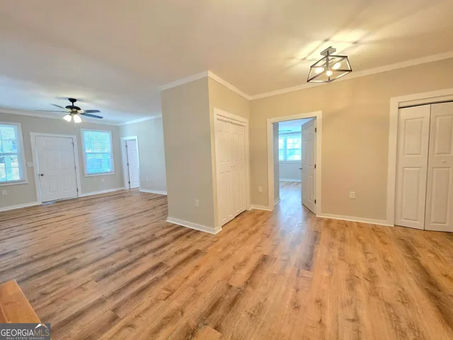 a view of livingroom with hardwood floor and window