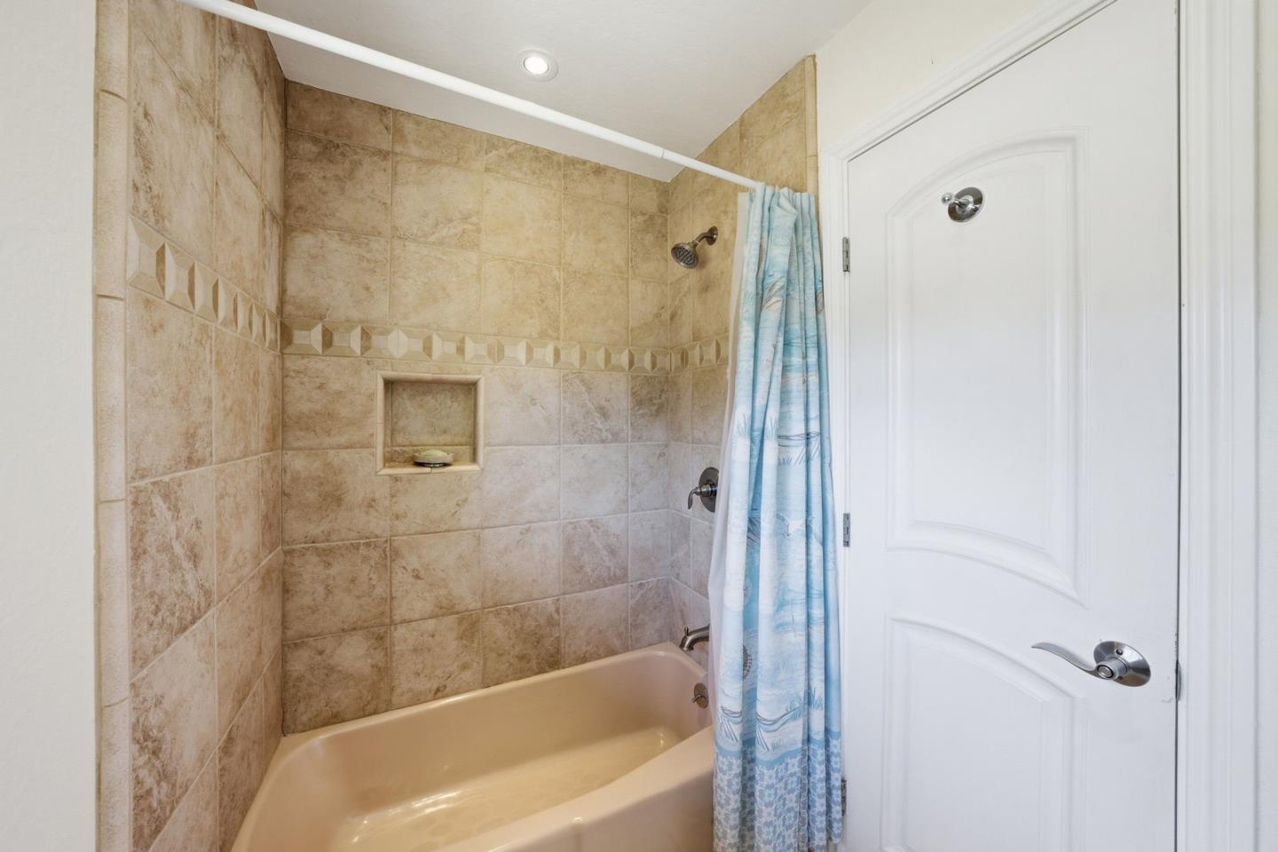 701 Day Valley Road Aptos, CA 95003 - Photo 26 of 43 a bathroom with a shower and a bath tub