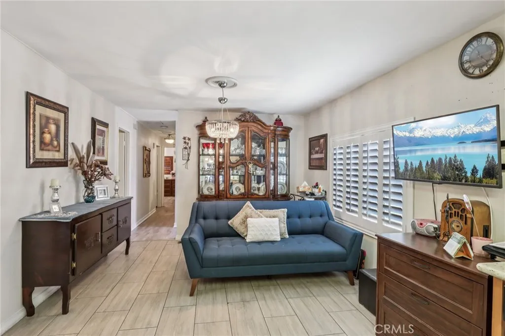 3700 Buchanan Street, Unit 28 Riverside, CA 92503 - Photo 11 of 35 a living room with furniture and view of kitchen