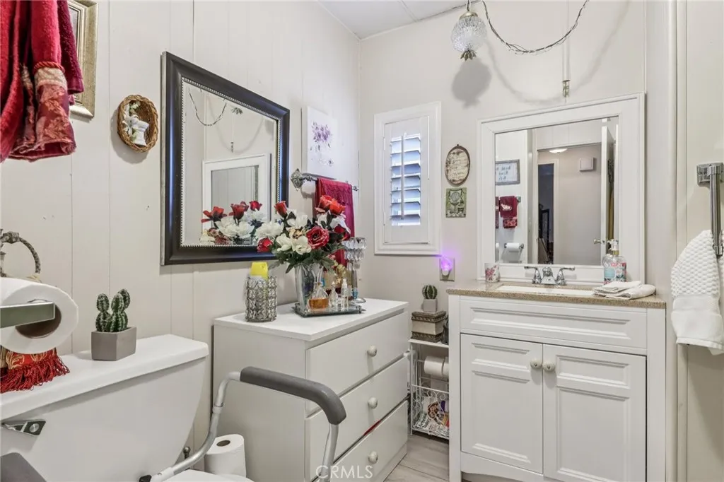 3700 Buchanan Street, Unit 28 Riverside, CA 92503 - Photo 21 of 35 a bathroom with a sink vanity and mirror