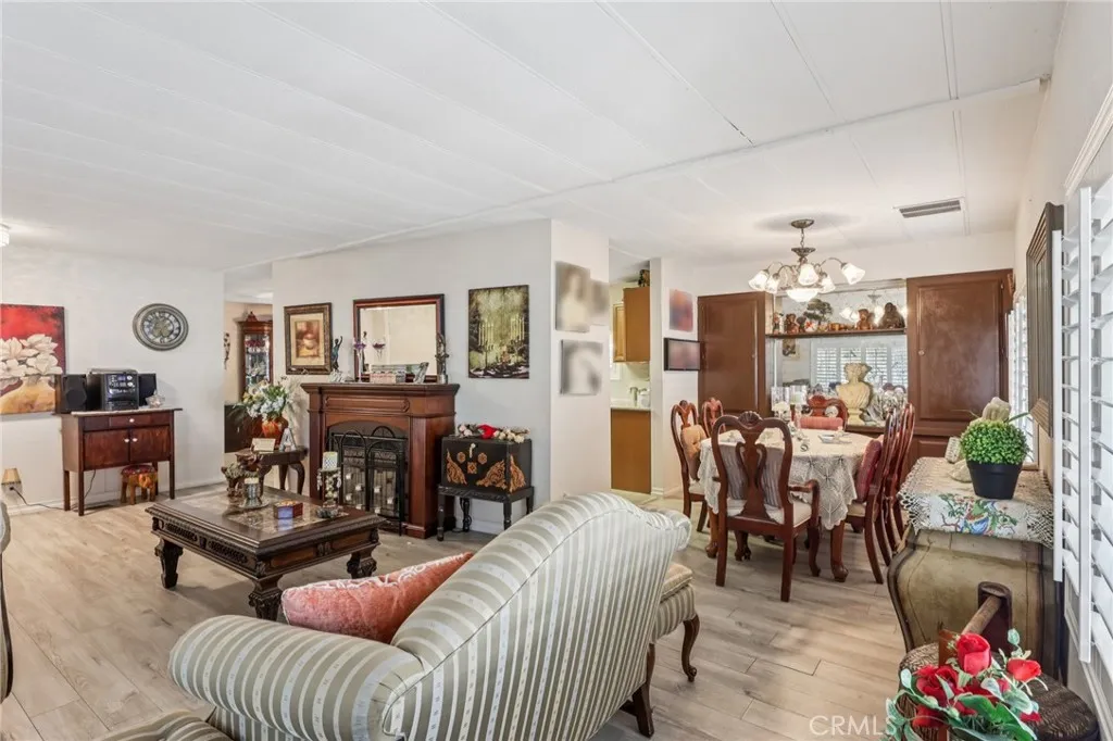 3700 Buchanan Street, Unit 28 Riverside, CA 92503 - Photo 7 of 35 a living room with furniture and a large window
