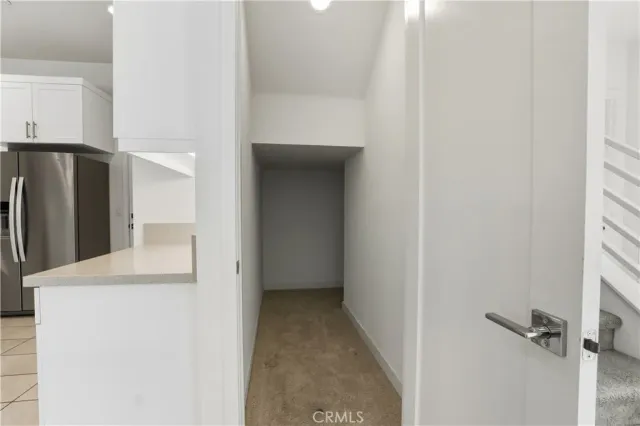 a bathroom with a toilet a sink and a mirror